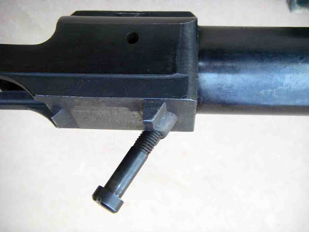 The M77’s front guard screw is angled at 62 degrees and serves to pull the action back and downward into the stock when tightened.